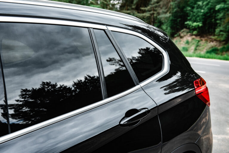 Modern car with tint back windows.